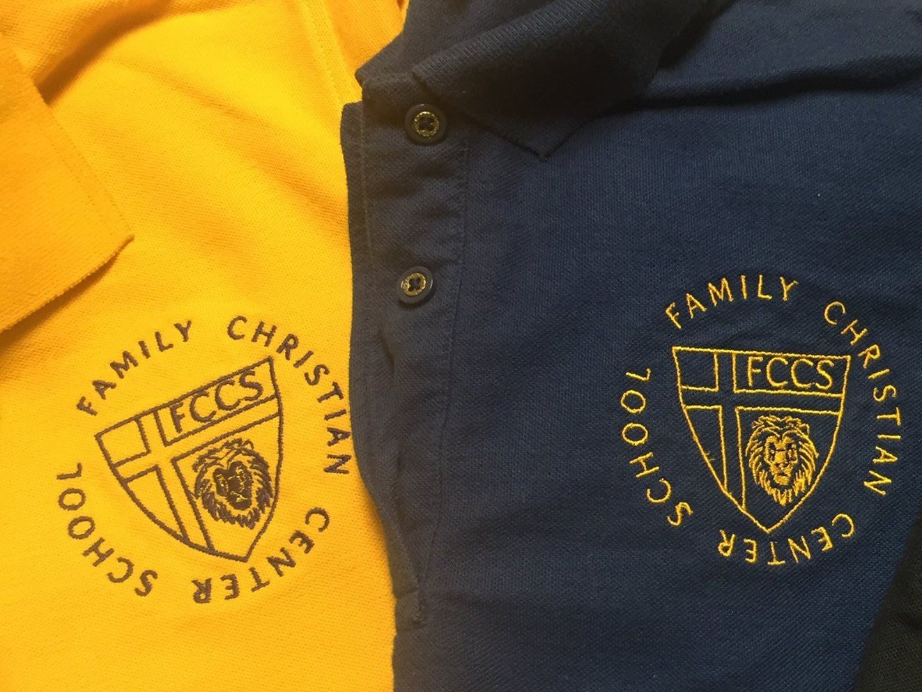 Uniform shirts goldenrod yellow and navy blue - Family Christian Center  Schools